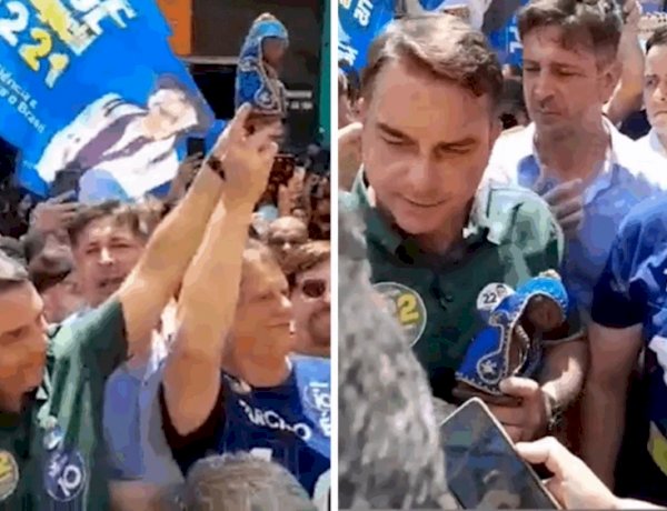 Flávio segura imagem de Nossa Senhora em ato para rebater fake